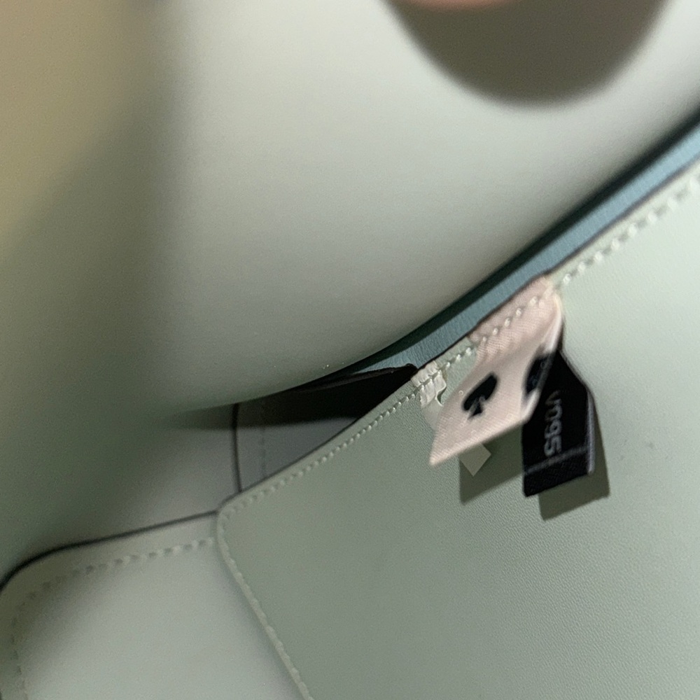 Gorgeous like new med Kate Spade Harper leather tote bag with flower bag charm. - Picture 8 of 10